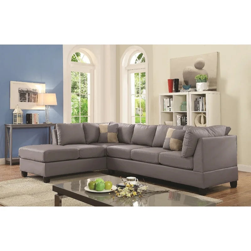 Divano sezionale a 4 posti con chaise longue reversibile e cuscini decorativi - Grigio